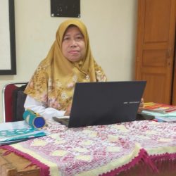Dra. Hj. Siti Syahidah